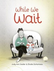 While We Wait by Sadler, Judy Ann