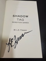 Shadow Tag book hand signed by L.E. Fraser