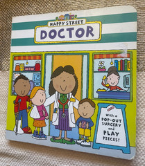 HAPPY STREET. DOCTOR. WITH POP-OUT SURGERY, BOOK ONLY – NOT POP OUT PIECES.