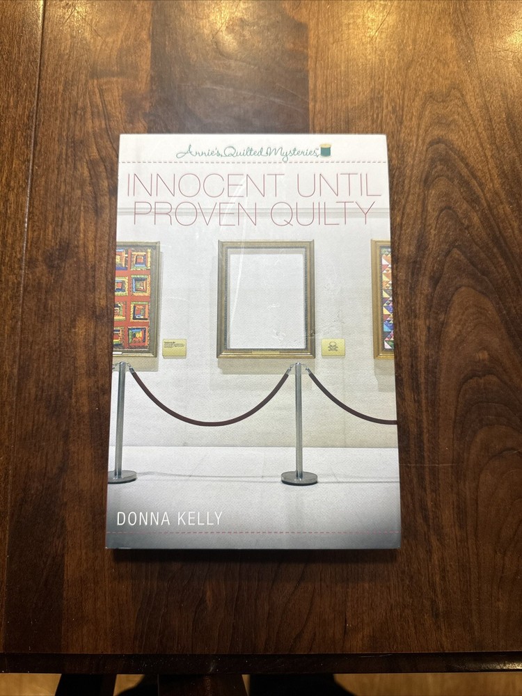Innocent Until Proven Quilty by Donna Kelly–Annie’s Quilted Mysteries HC DJ2015